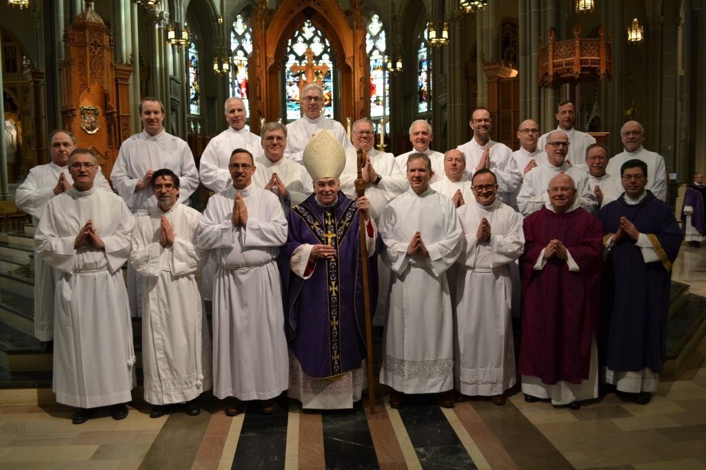 group gathered at the front of the Church